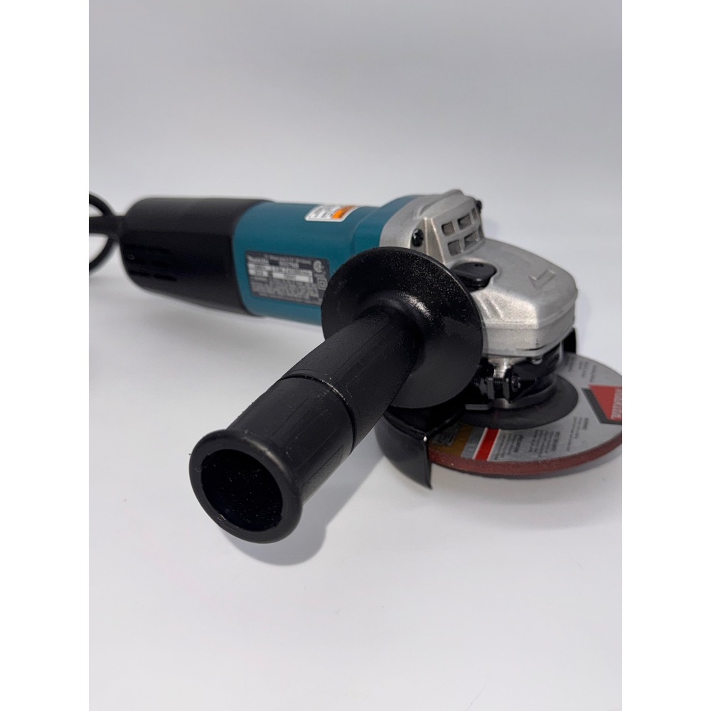 Makita 9557NB 4-1/2 Inch Corded Angle Grinder 7.5A 11000 RPM Teal Black - Picture 6 of 8